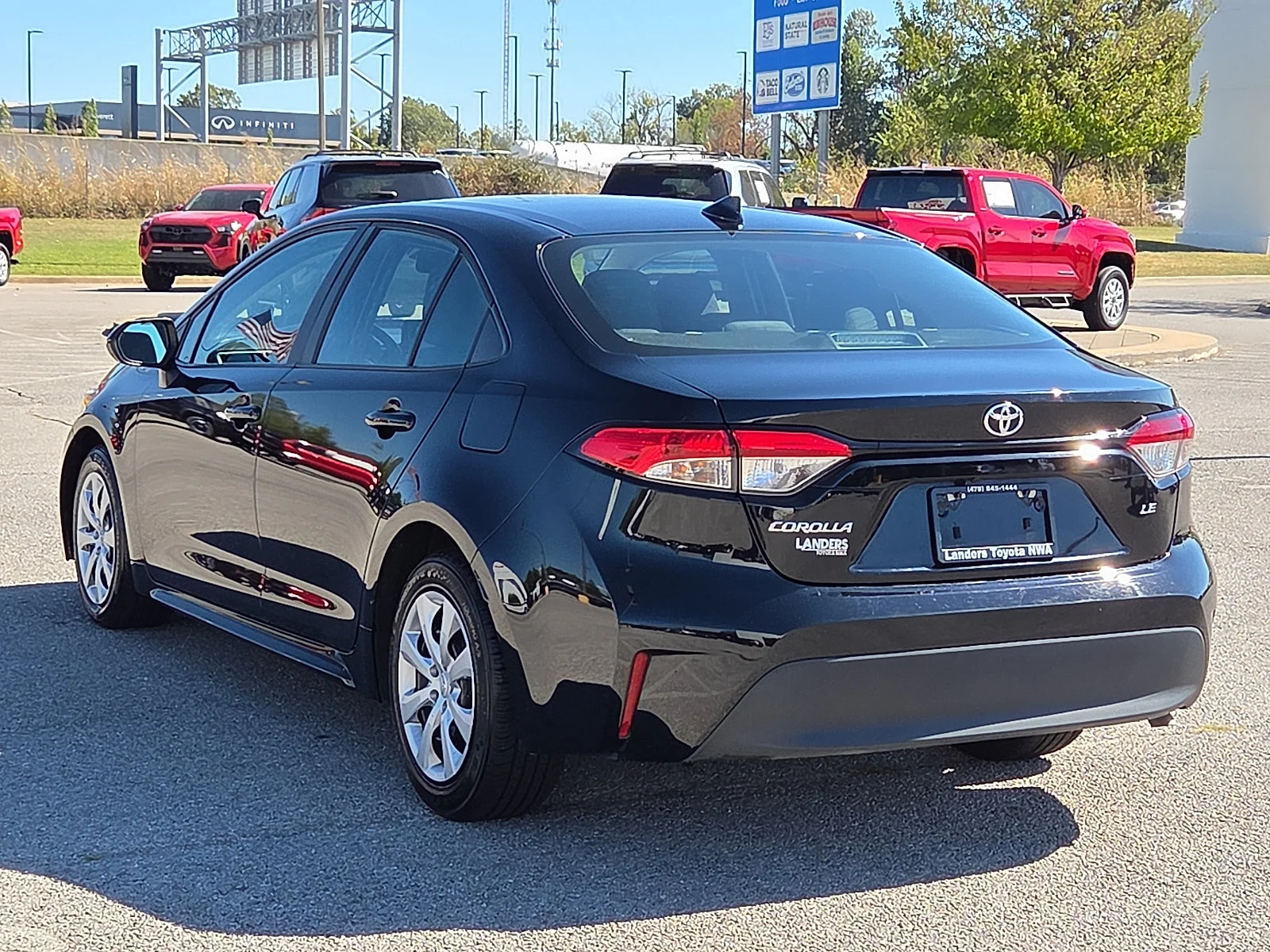 Used 2025 Midnight Black Metallic Toyota LE image 4