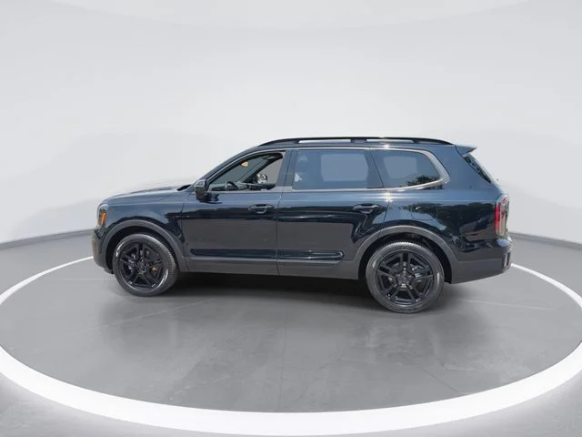 Used 2025 Black Kia EX X-Line image 6