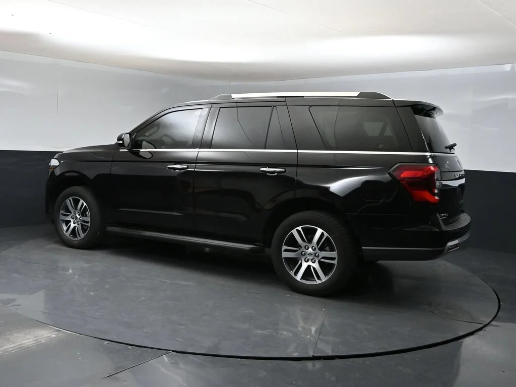 Used 2024 Black Metallic Ford Limited image 4