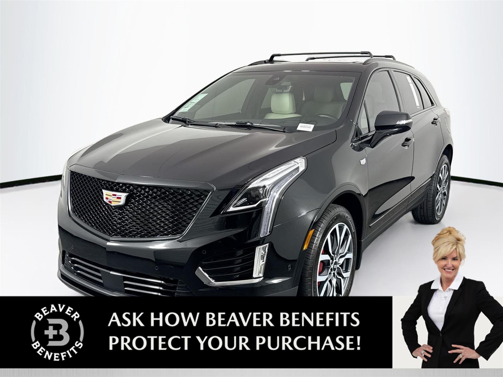 Used 2024 Stellar Black Metallic Cadillac AWD Sport image 1