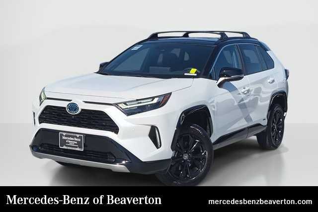 Used 2023 Wind Chill Pearl/Midnight Black Metallic Toyota Hybrid XSE image 1