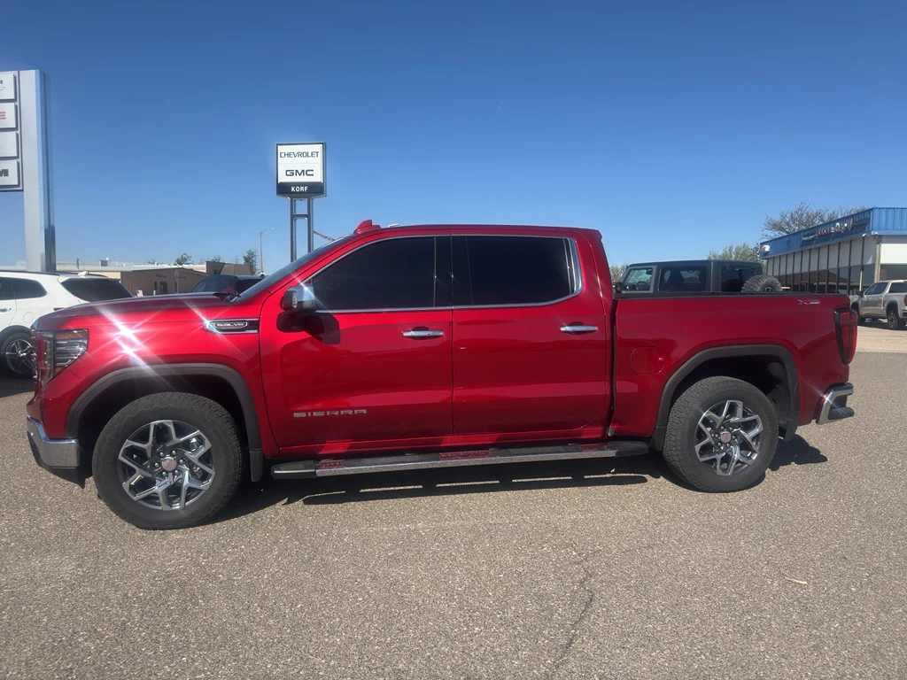 Used 2025 Volcanic Red Tintcoat GMC SLT image 1