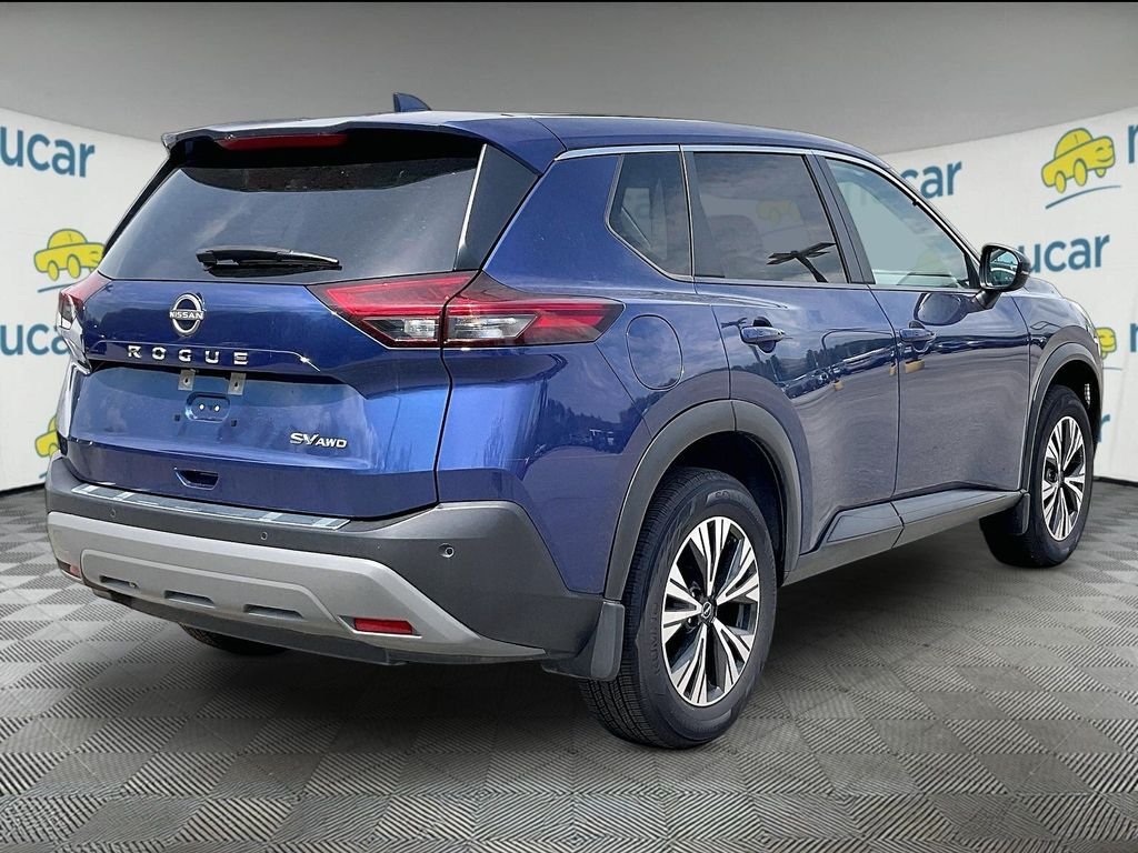Used 2023 Caspian Blue Metallic Nissan SV image 6