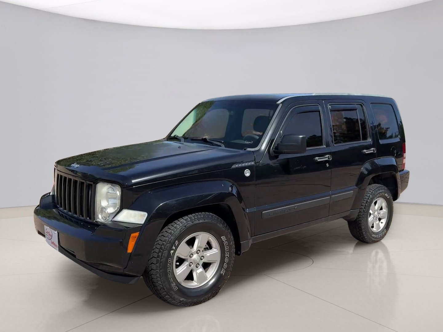 Used 2011 Black Jeep SPORT image 1