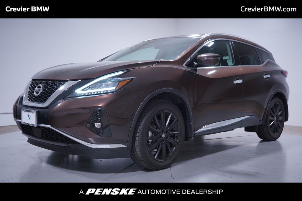 Used 2022 Almond Pearl Nissan Platinum image 1