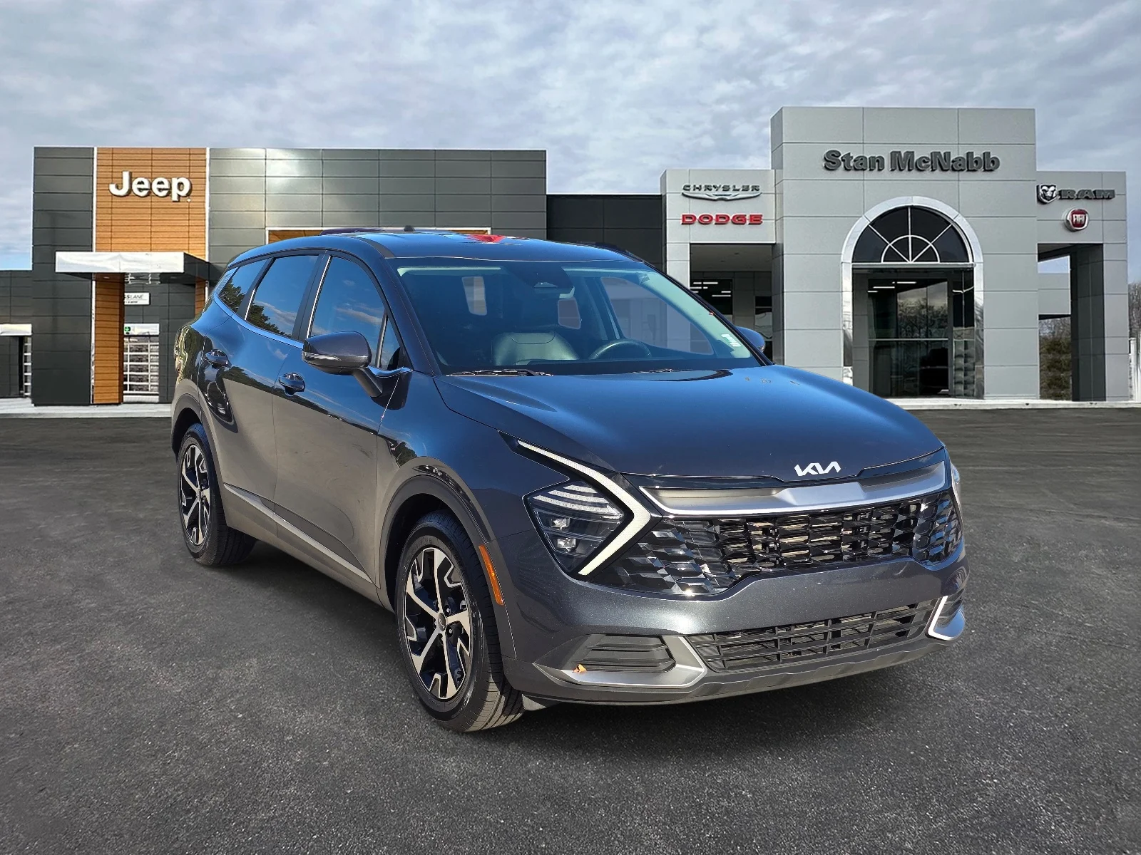 Used 2024 Gravity Gray Kia EX image 1