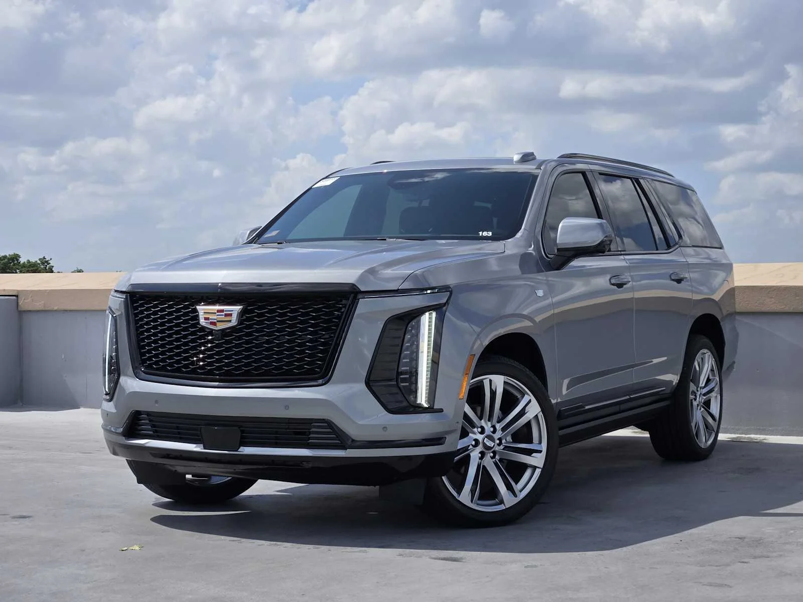 New 2026 Argent Silver Metallic Cadillac Sport image 1