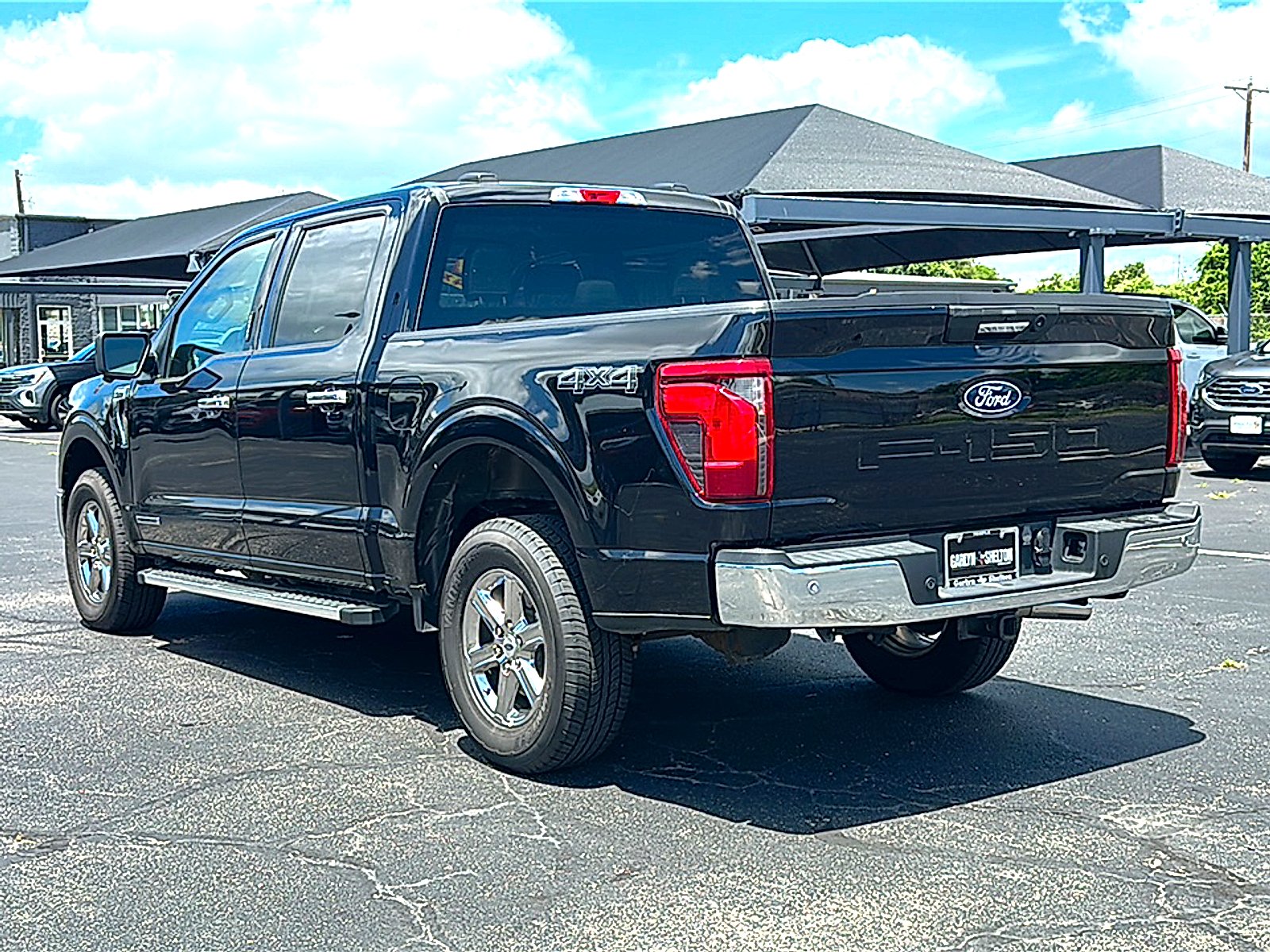 Used 2024 Agate Black Metallic Ford XLT image 6