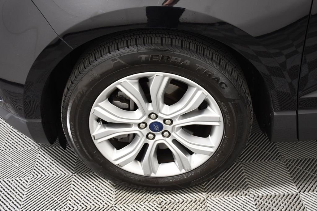 Used 2022 Agate Black Metallic Ford Titanium image 11