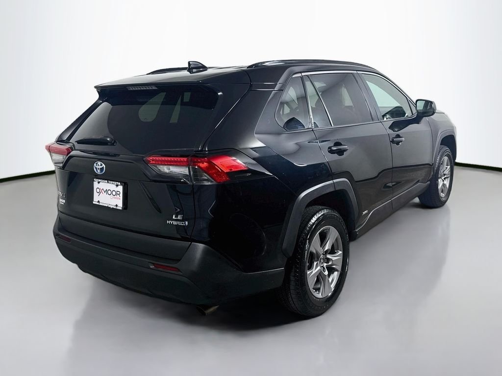 Used 2022 Midnight Black Metallic Toyota Hybrid LE image 7