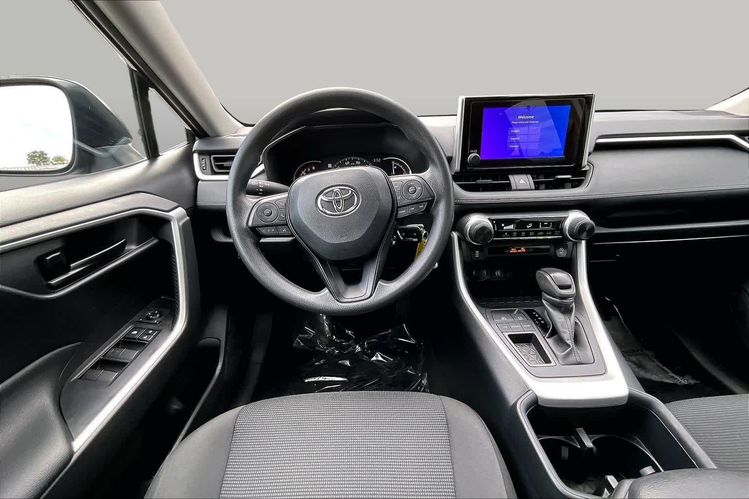Used 2024 Magnetic Gray Metallic Toyota LE image 6