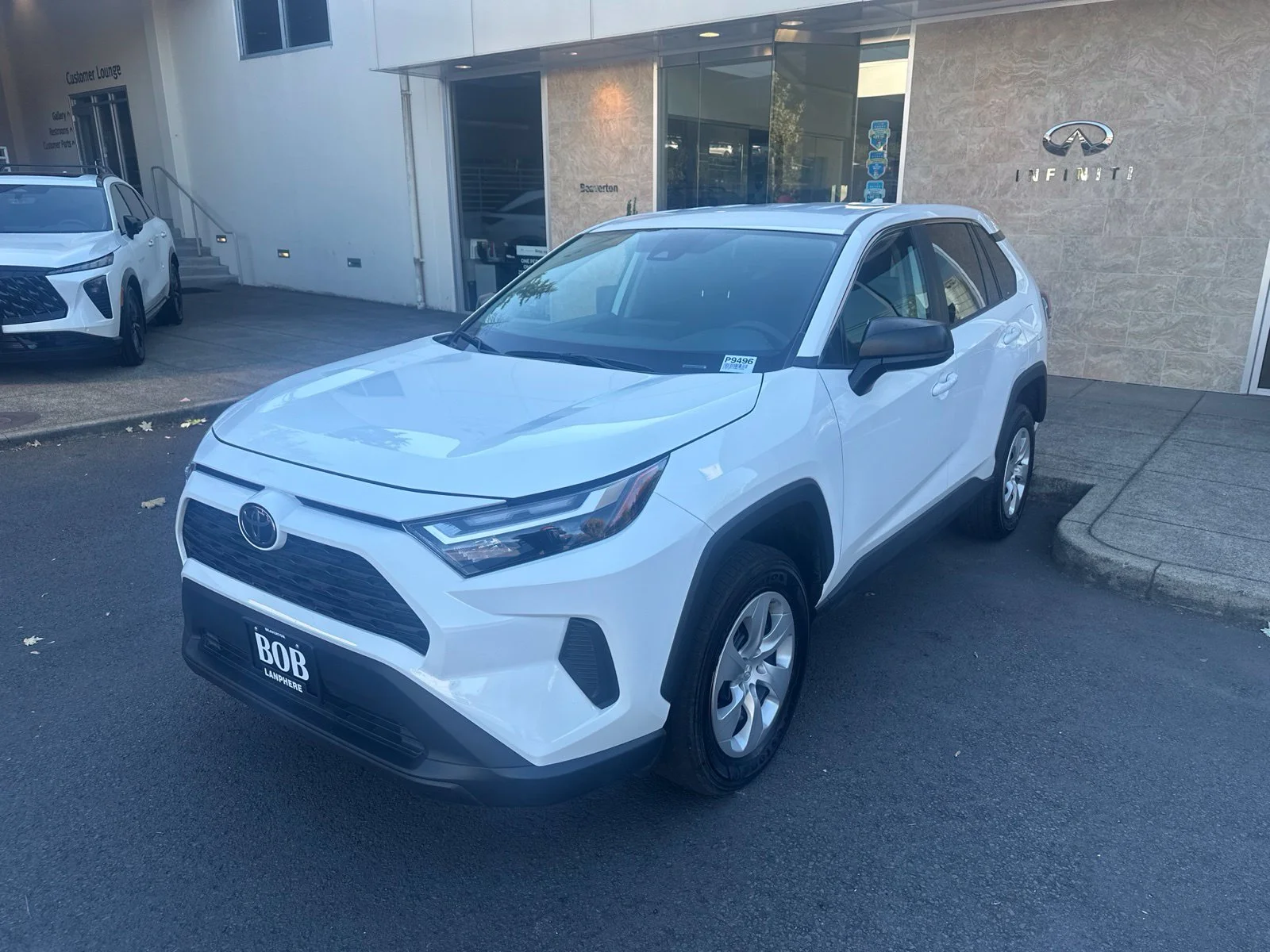 Used 2025 White Toyota LE image 1