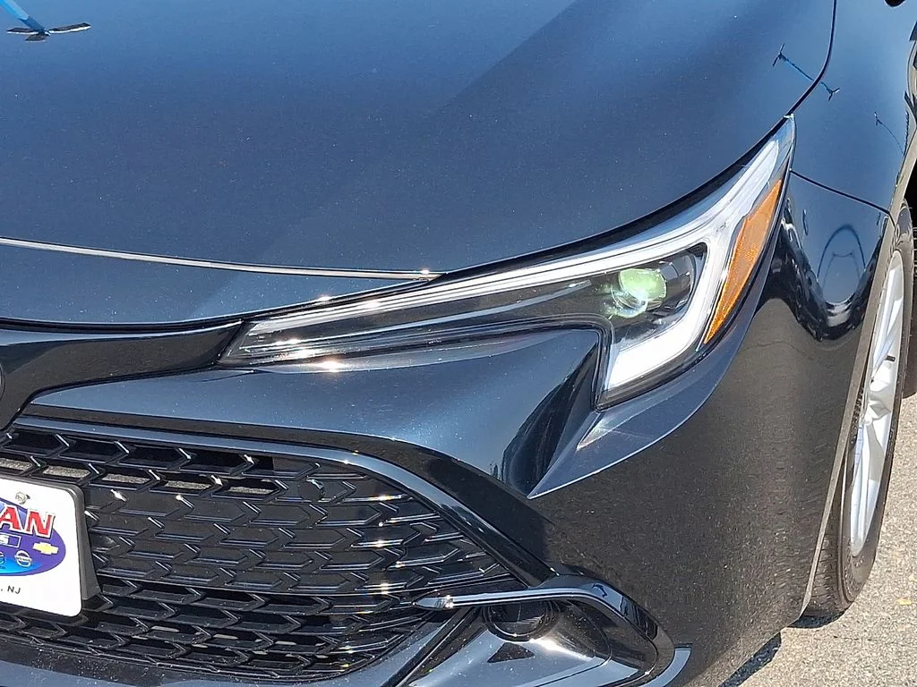 Used 2025 Midnight Black Metallic Toyota SE image 9