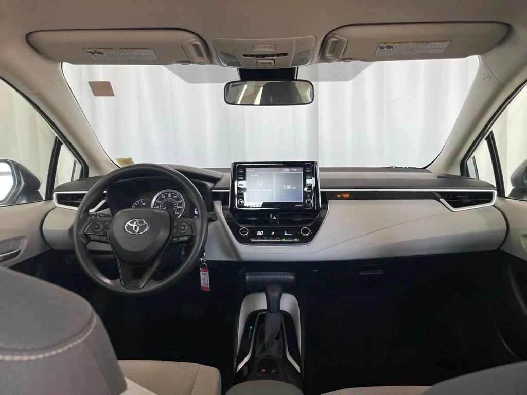 Used 2021 White Toyota LE image 9