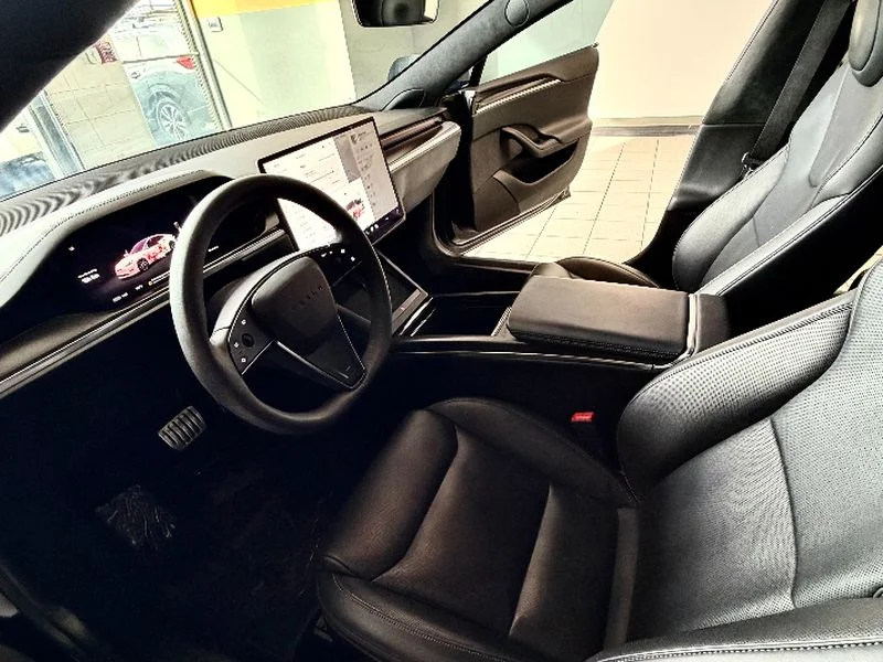 Used 2022 Solid Black Tesla Plaid image 11