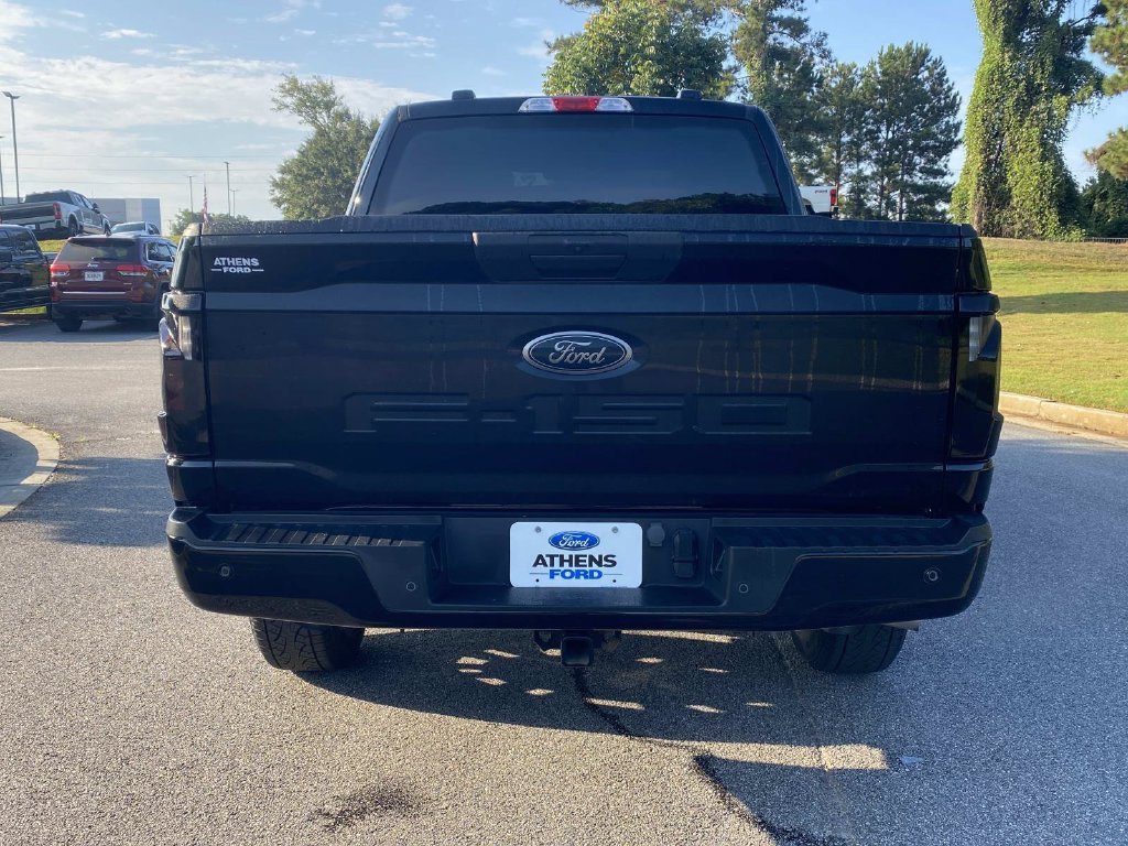 Used 2025 Agate Black Metallic Ford STX image 4