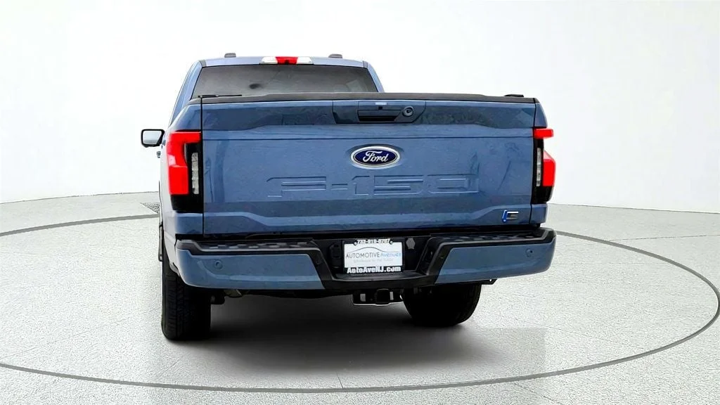 Used 2023 Azure Gray Metallic Tri-Coat Ford XLT 4WD SuperCrew 5.5