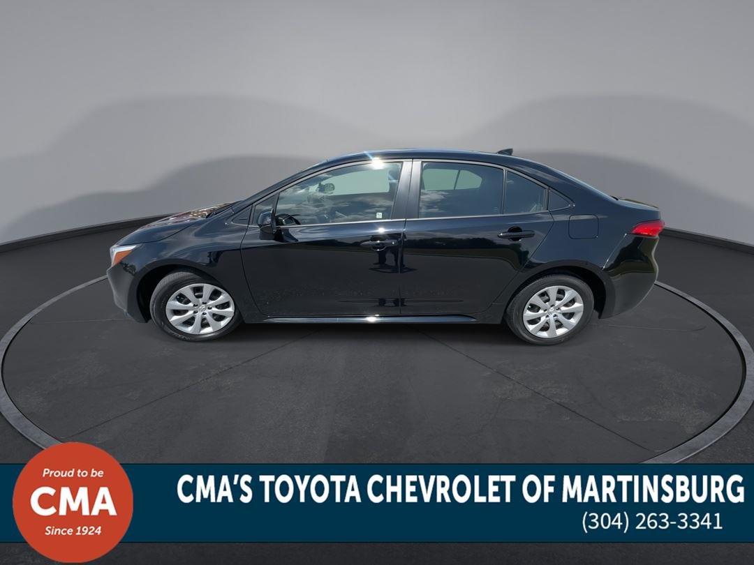 Used 2025 Midnight Black Metallic Toyota Hybrid LE image 5
