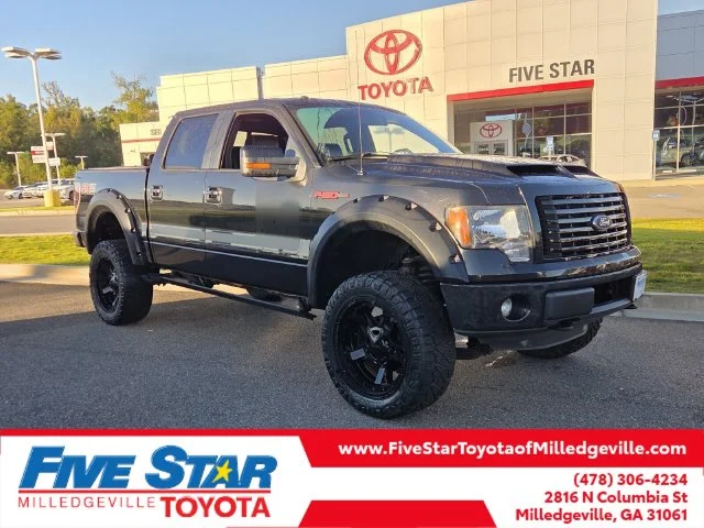 Used 2012 Black Ford FX4 image 1