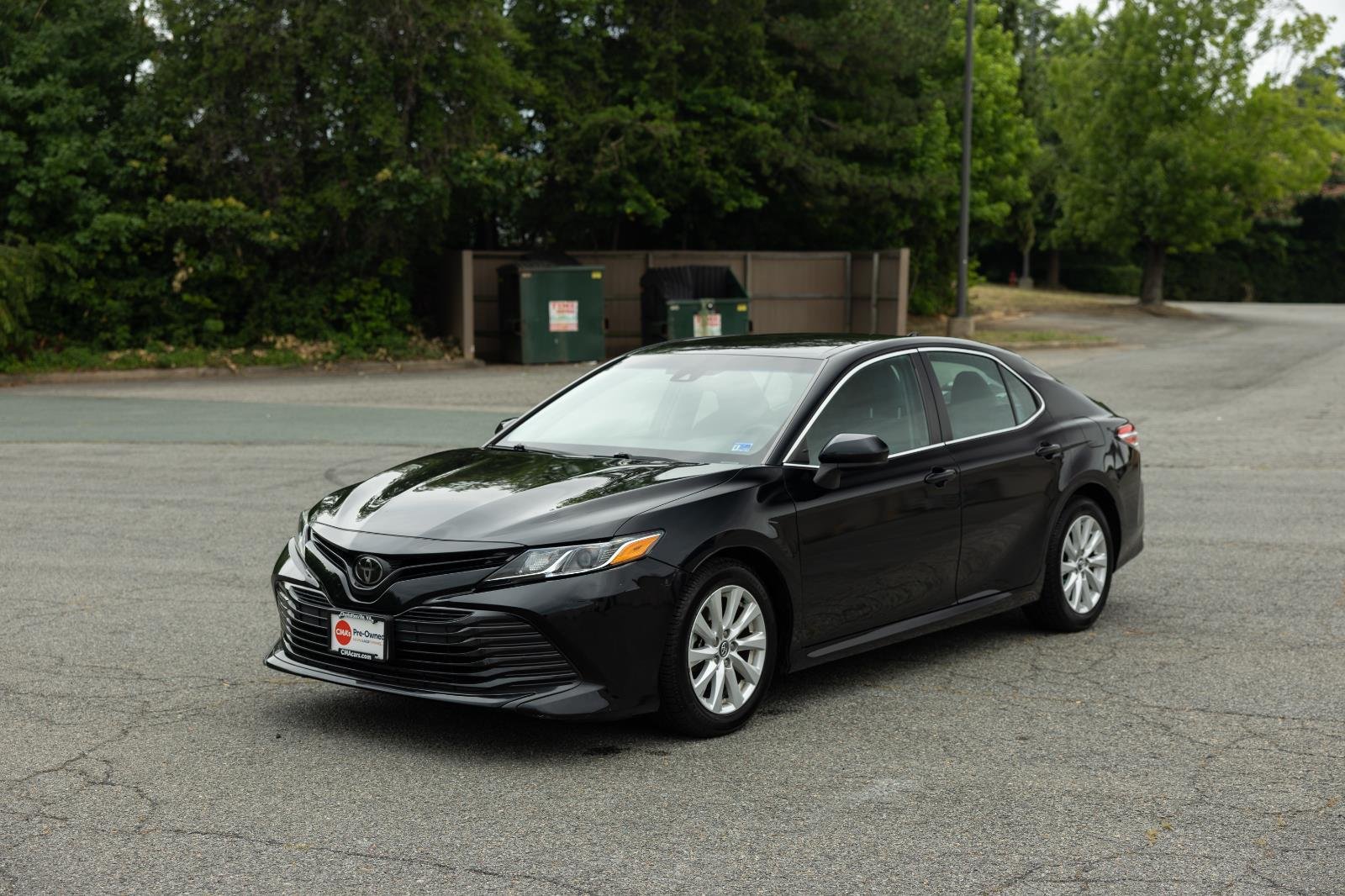 Used 2020 Midnight Black Metallic Toyota LE image 1