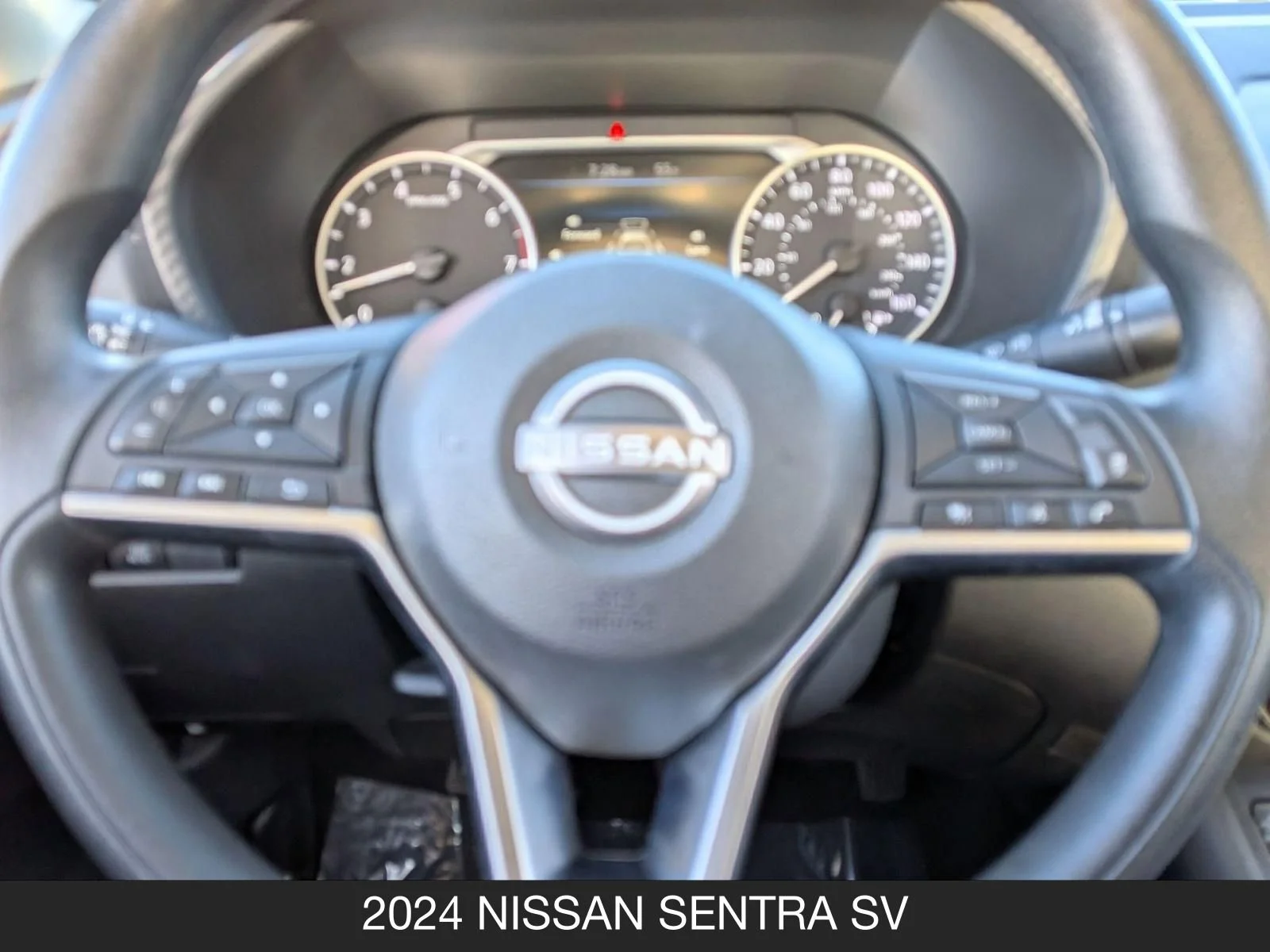 Used 2024 Electric Blue Metallic Nissan SV image 12