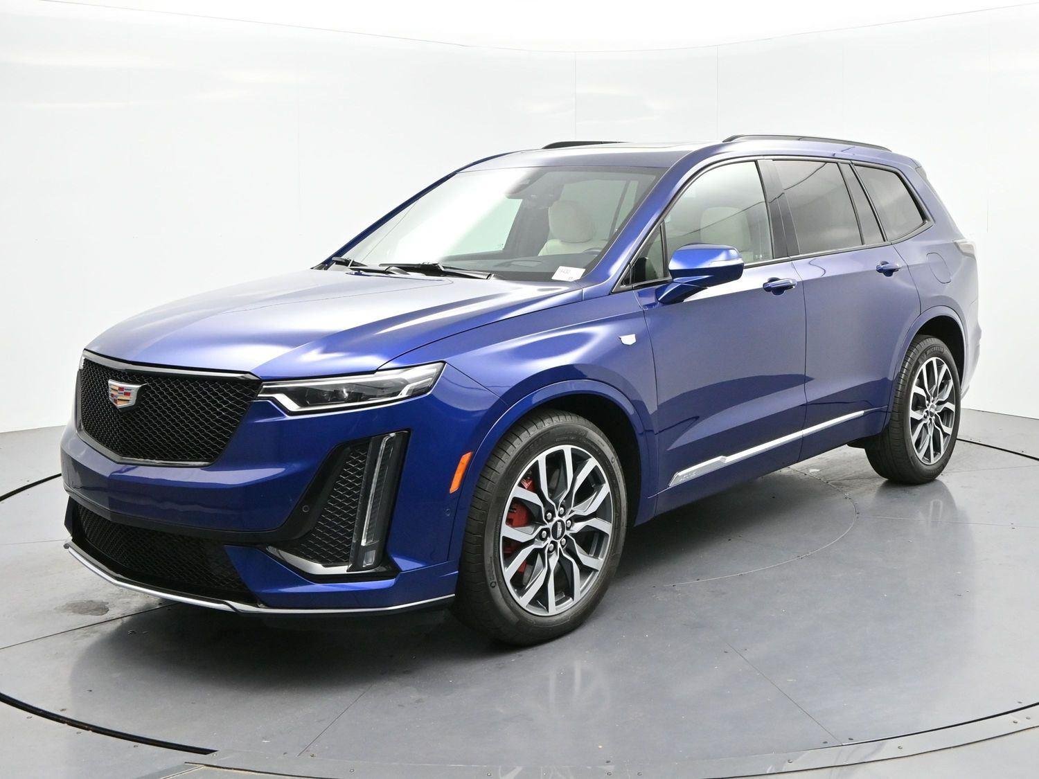 Used 2024 Opulent Blue Metallic Cadillac Sport image 3