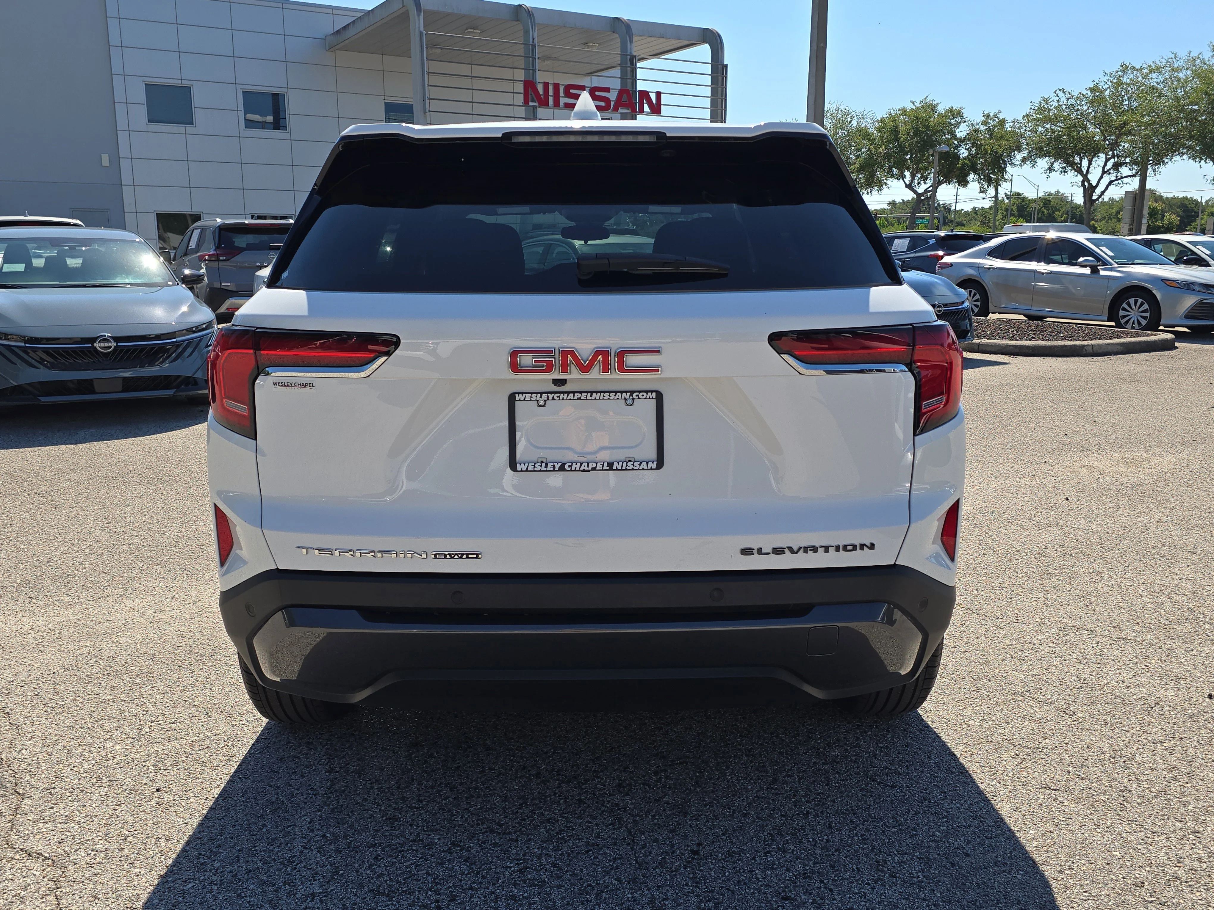 Used 2025 Summit White GMC AWD Elevation image 7