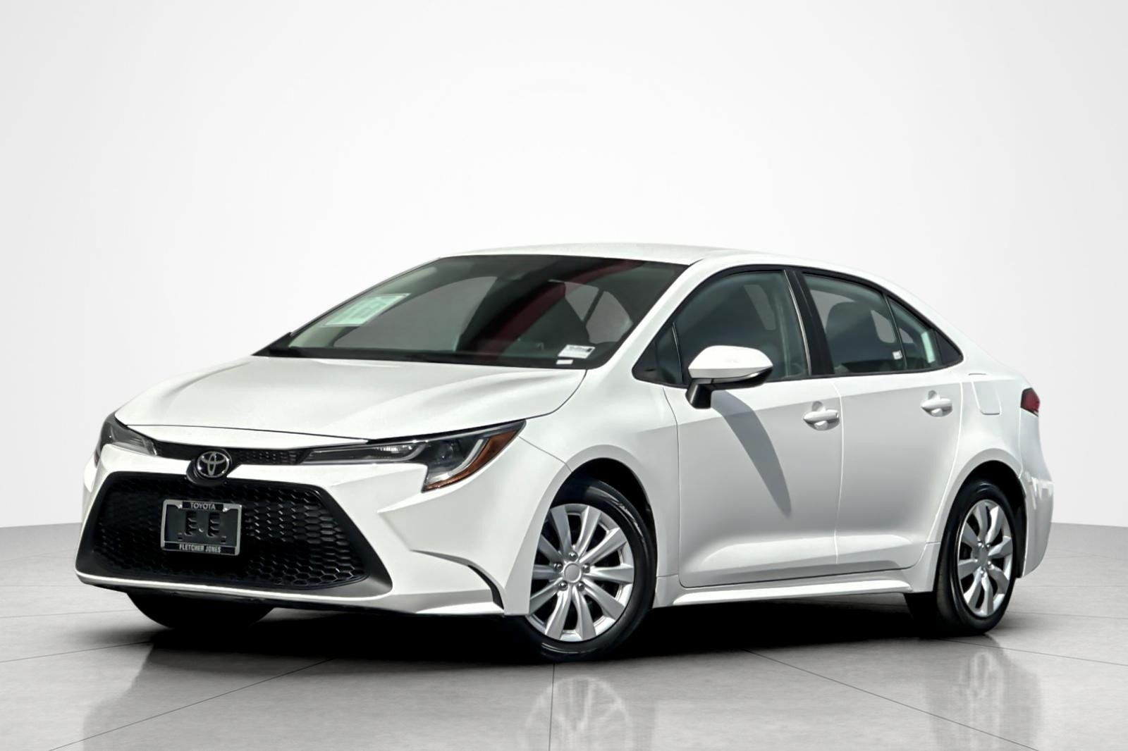 Certified Used 2021 Super White Toyota LE image 1