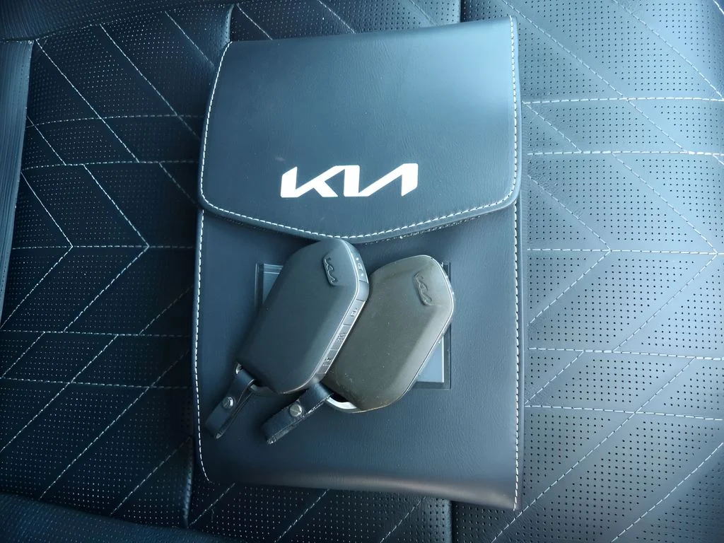 Used 2024 Dawning Red Kia EX X-Line image 9