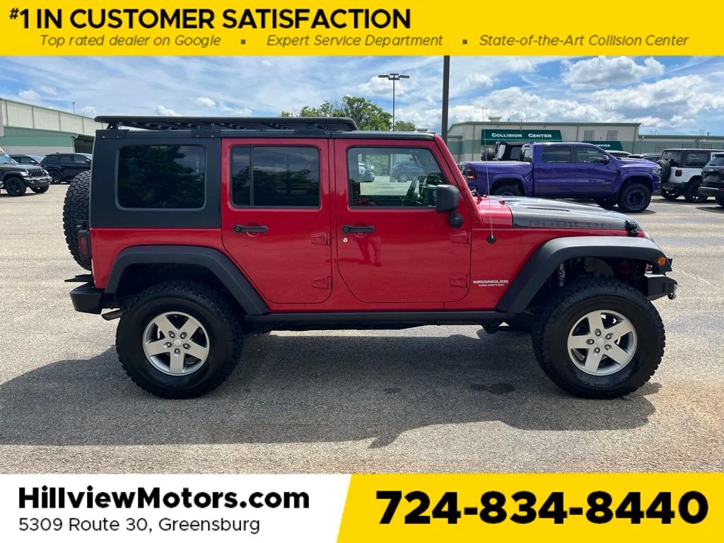 Used 2010 Flame Red Jeep Unlimited Rubicon image 6
