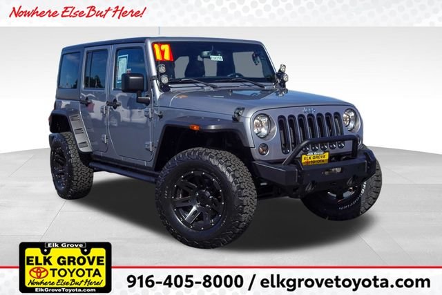 Used 2017 Silver Jeep Unlimited Sport image 1
