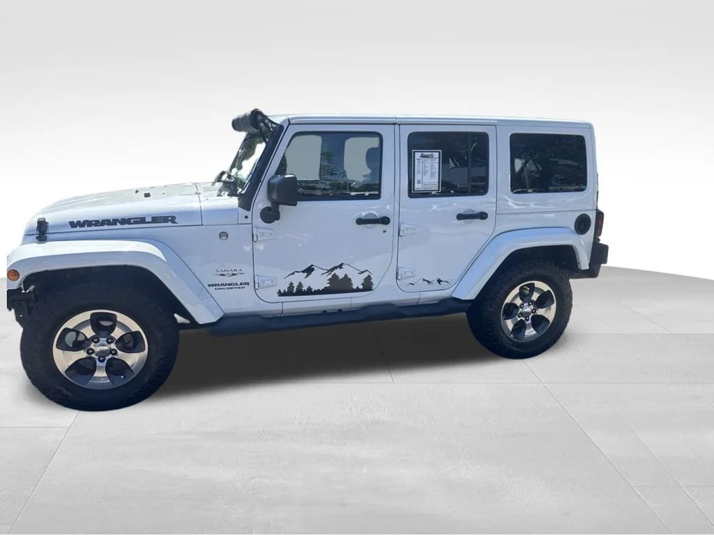 Used 2017 White Jeep Unlimited Sahara image 1