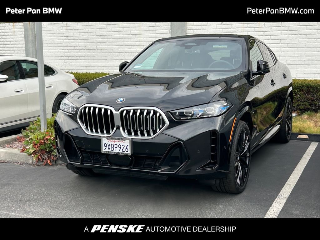 Used 2026 Black Sapphire Metallic BMW xDrive40i image 1