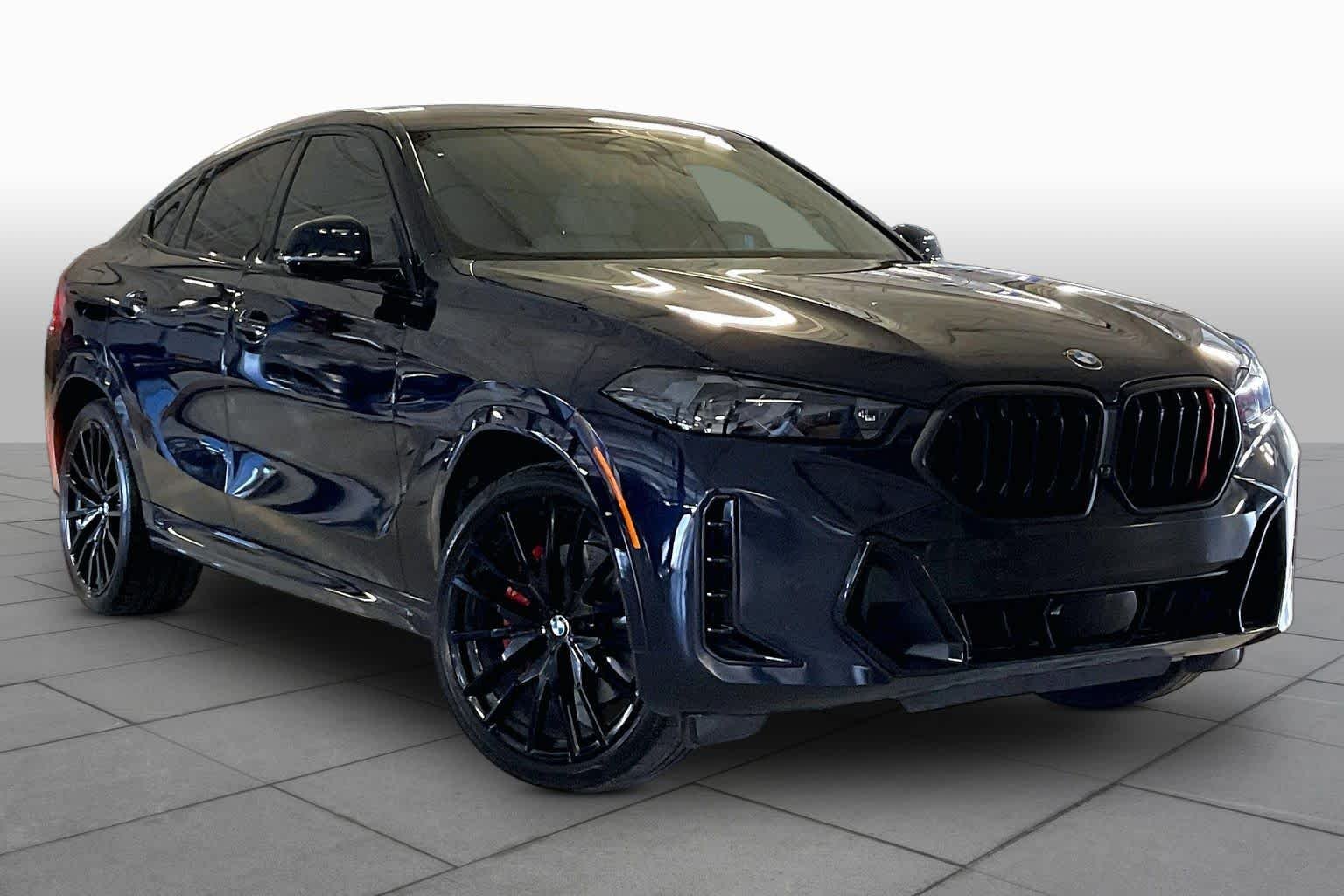 Certified Used 2025 Carbon Black Metallic BMW xDrive40i image 2