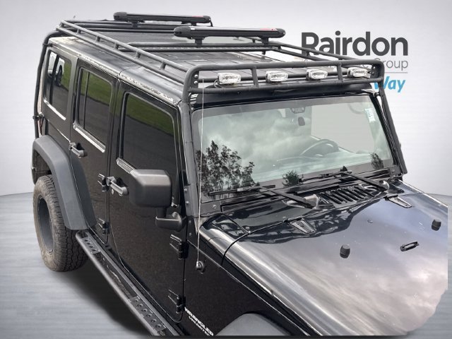Used 2012 Black Clearcoat Jeep Unlimited Sport image 14