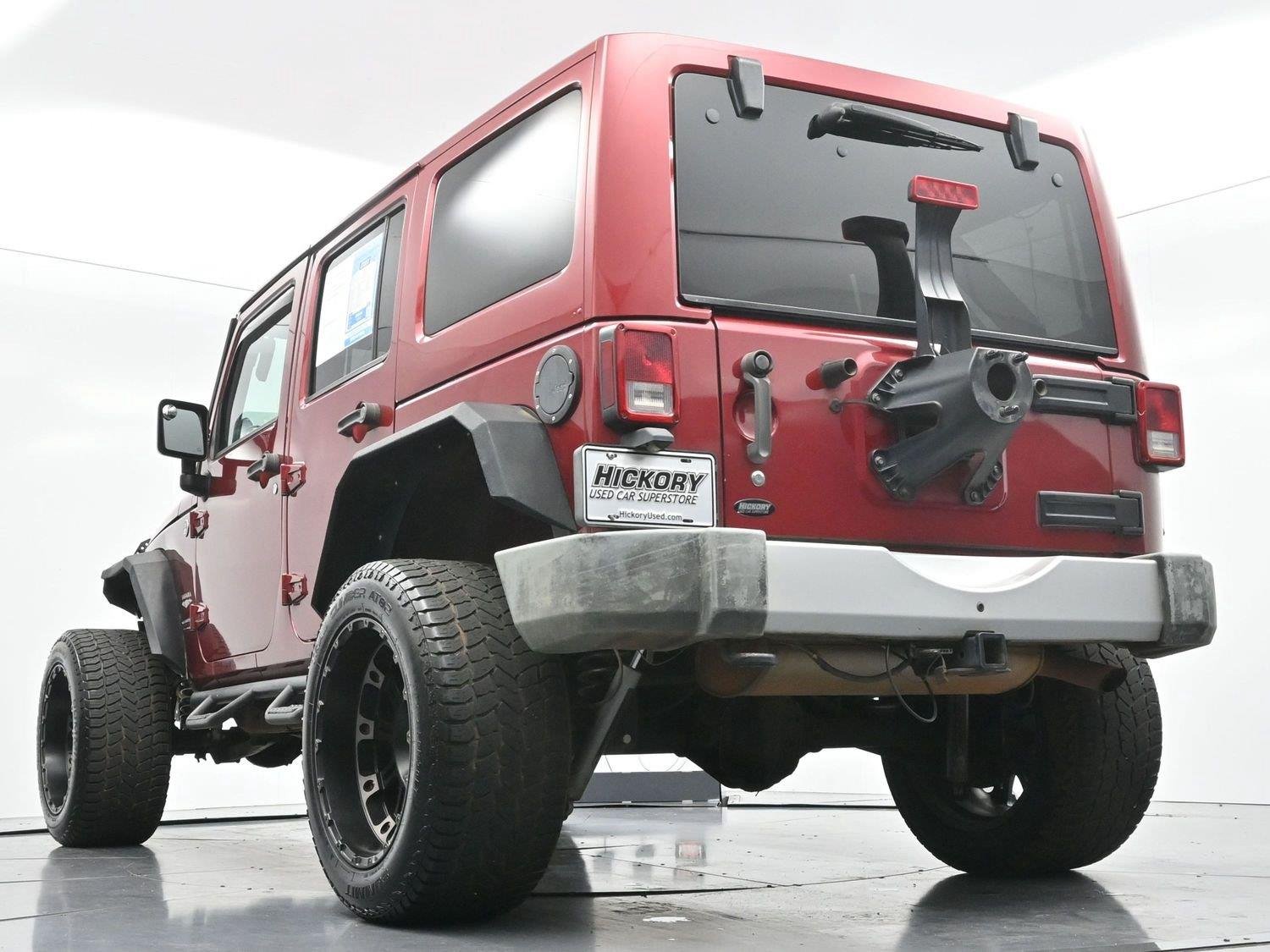 Used 2011 Deep Cherry Red Crystal Pearlcoat Jeep Sahara image 48