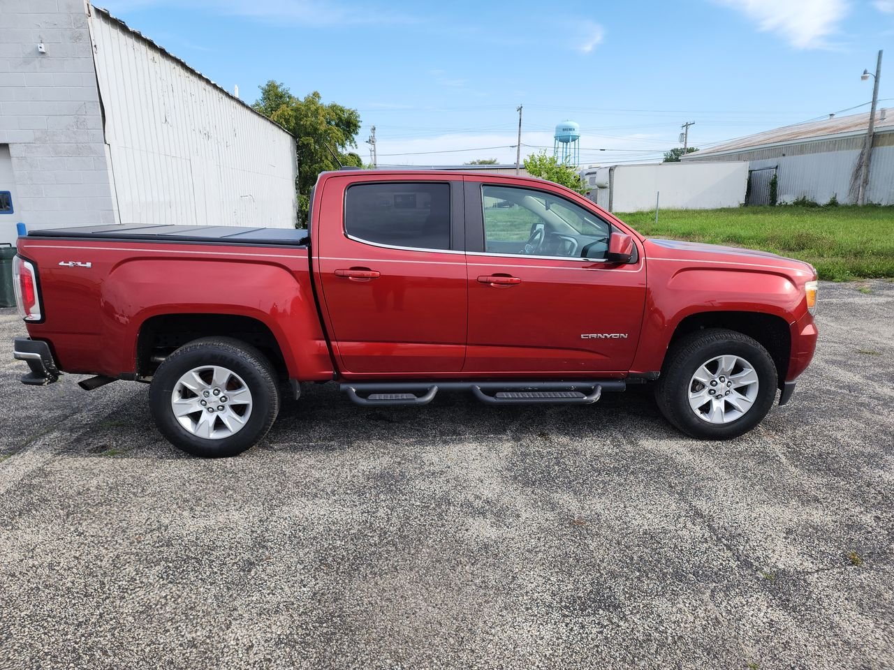Used 2016 COPPER RED METALLIC GMC 4WD SLE image 9