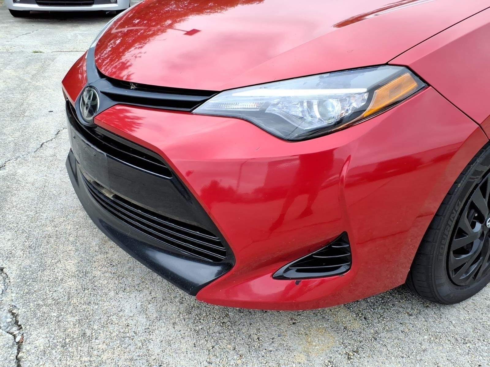 Used 2018 Barcelona Red Metallic Toyota LE image 3