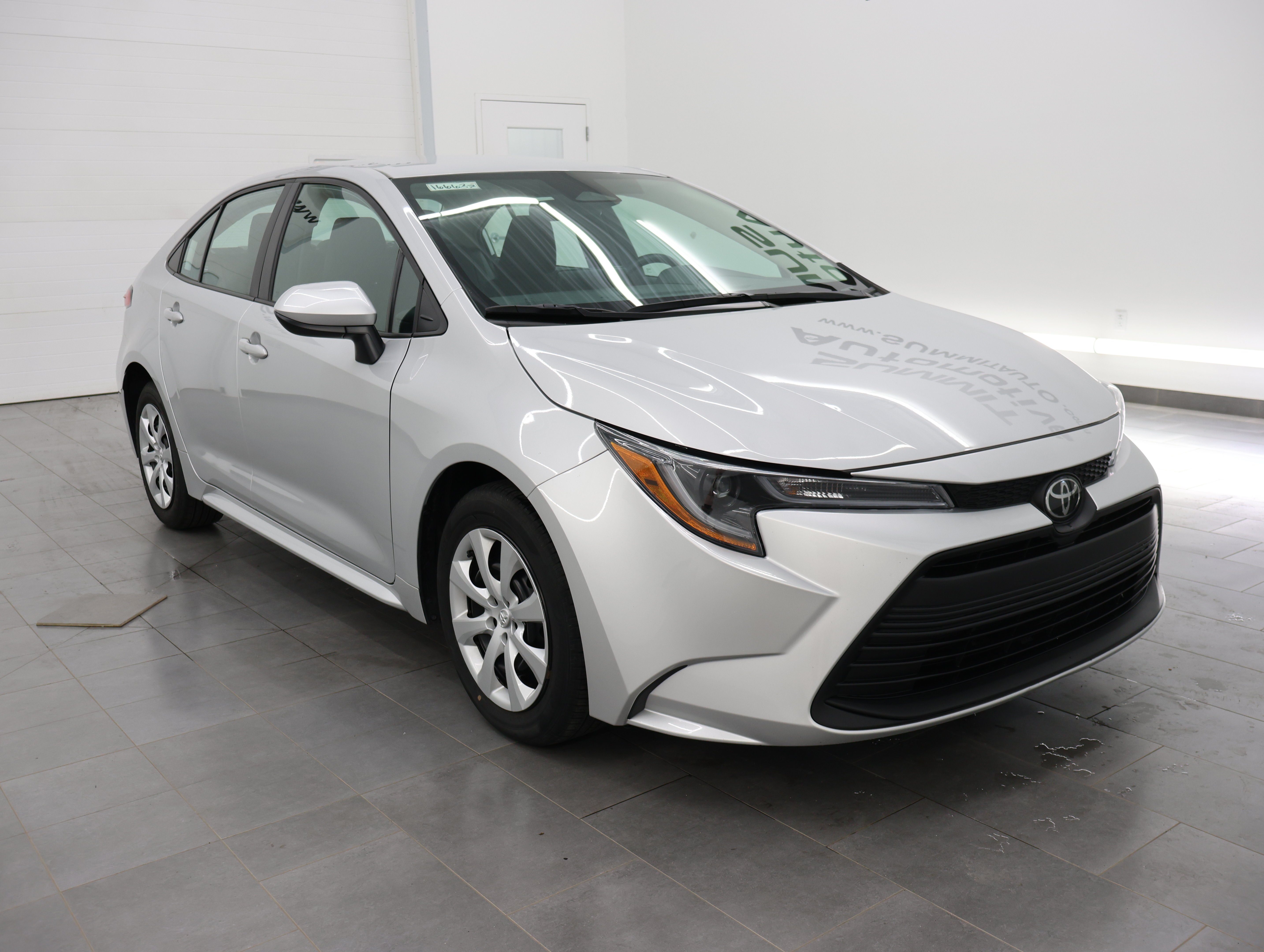 Used 2024 Classic Silver Metallic Toyota LE: LE-FOUR DOOR-FWD-ADAPTIVE CRUISE-BACKUP CAM-NEW TIRES image 2