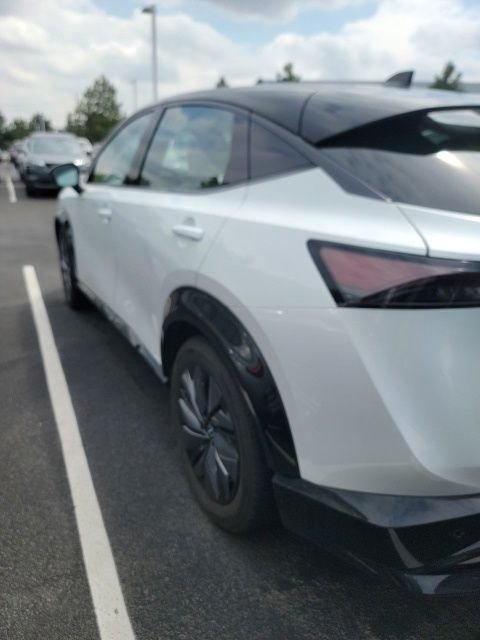 Used 2024 White Nissan EVOLVE+ e-4ORCE image 9
