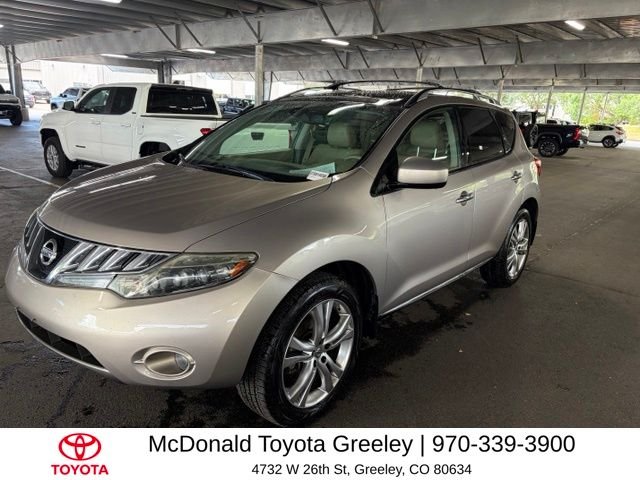 Used 2009 Beige Nissan LE image 1