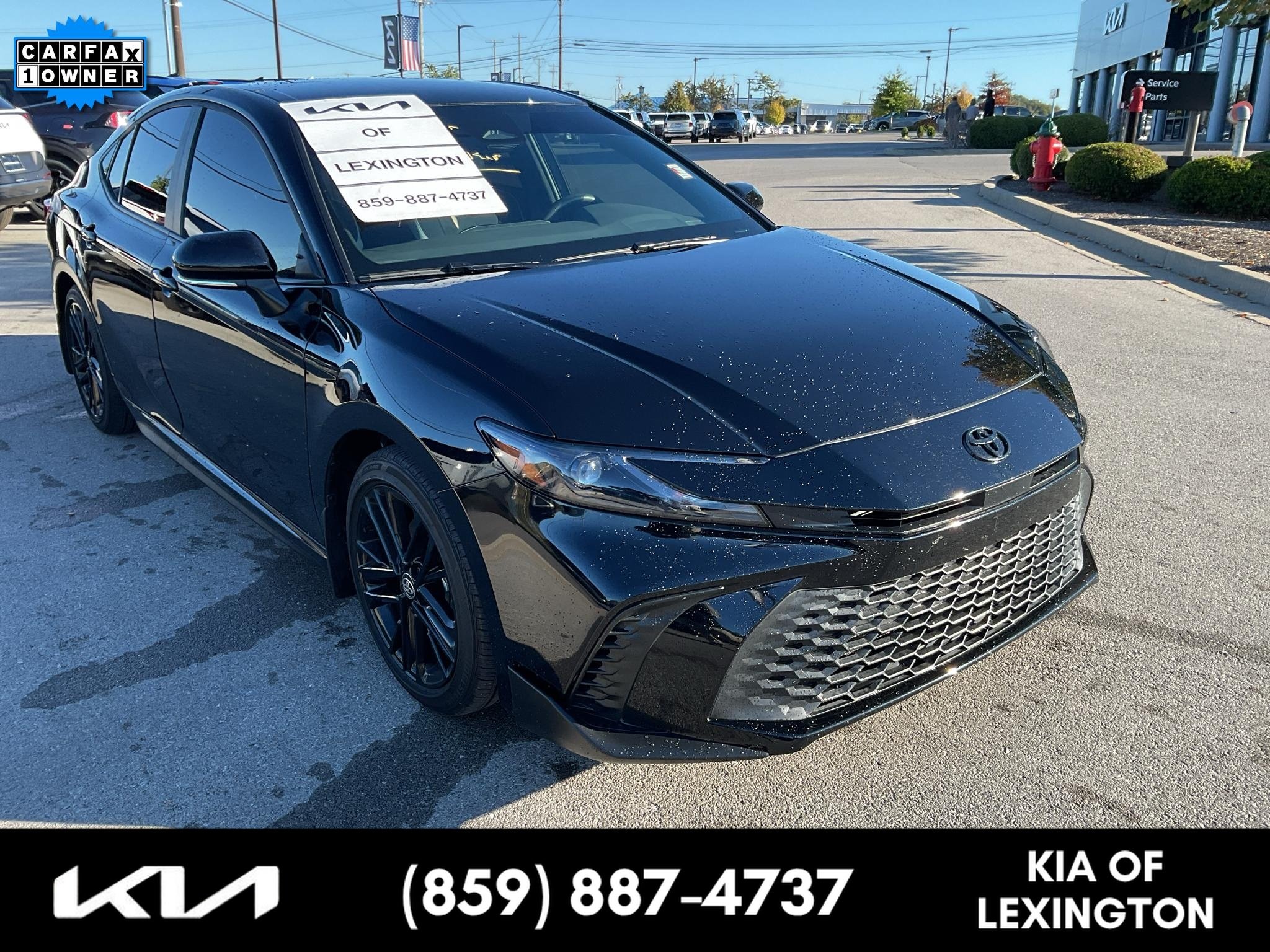 Used 2025 Midnight Black Metallic Toyota SE image 1