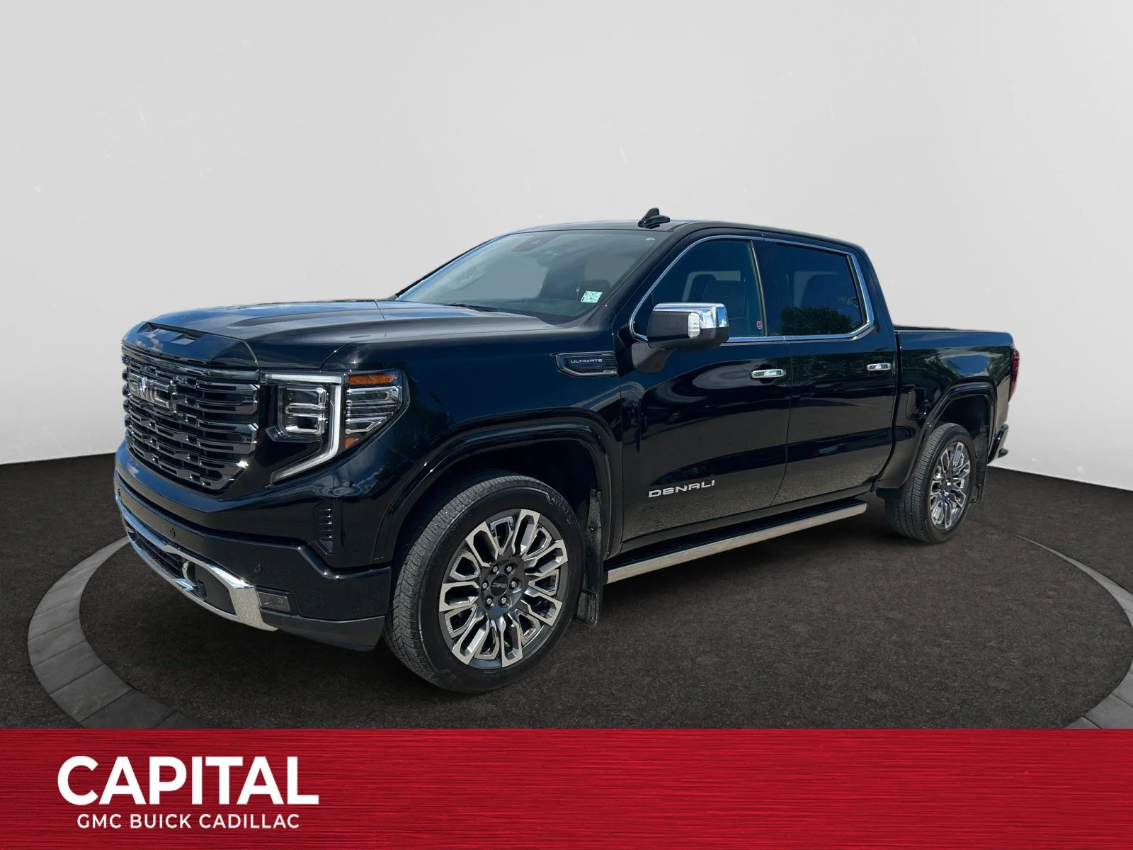 Used 2025 Black GMC Denali Ultimate Crew Cab image 1