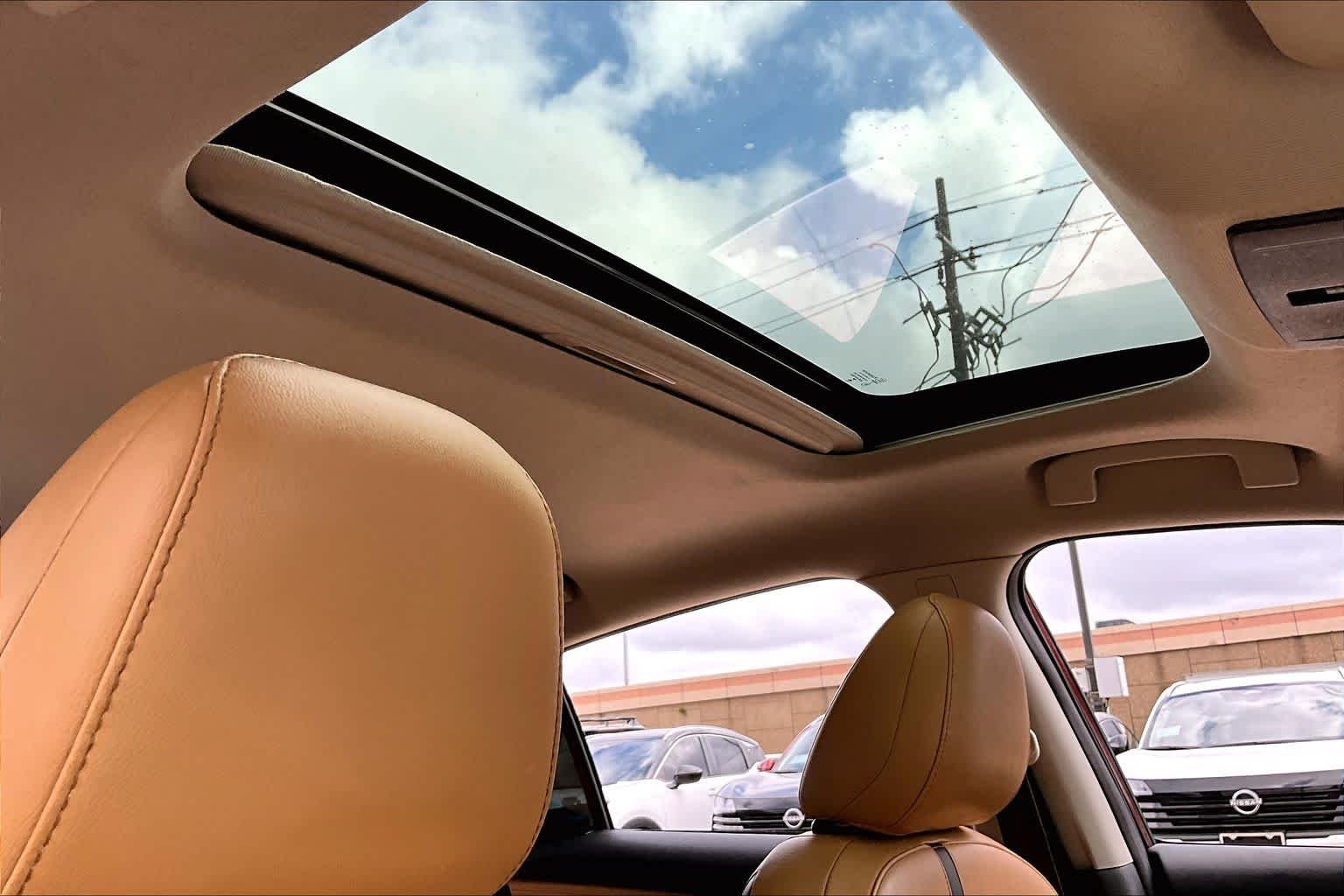 Used 2024 Rosewood Metallic Nissan SV image 14