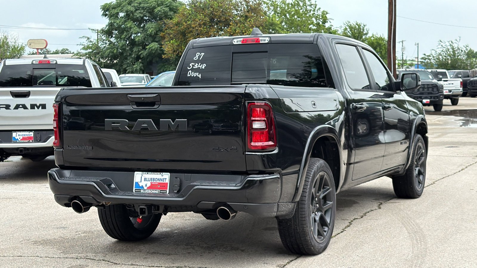 New 2026 Diamond Black Crystal Pearl-Coat Exterior Paint RAM Laramie image 5