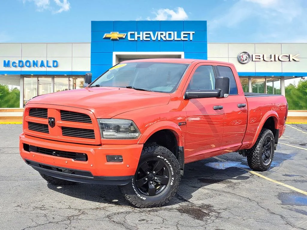 2016 RAM 1500 Outdoorsman Quad Cab 4x4 6'4" Box's photo