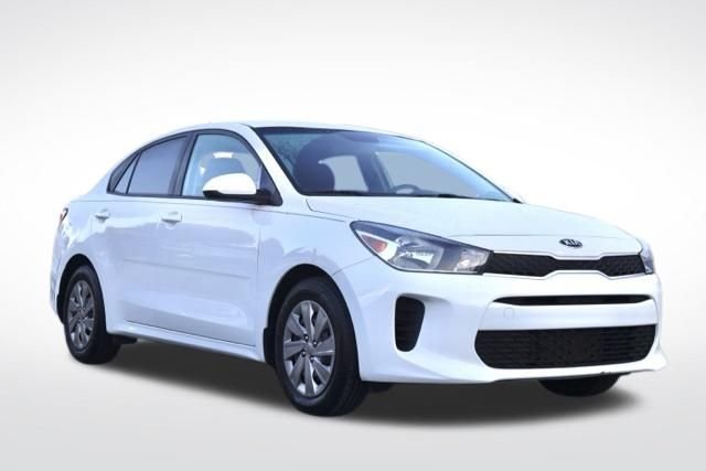 Used 2020 Clear White Kia LX image 1