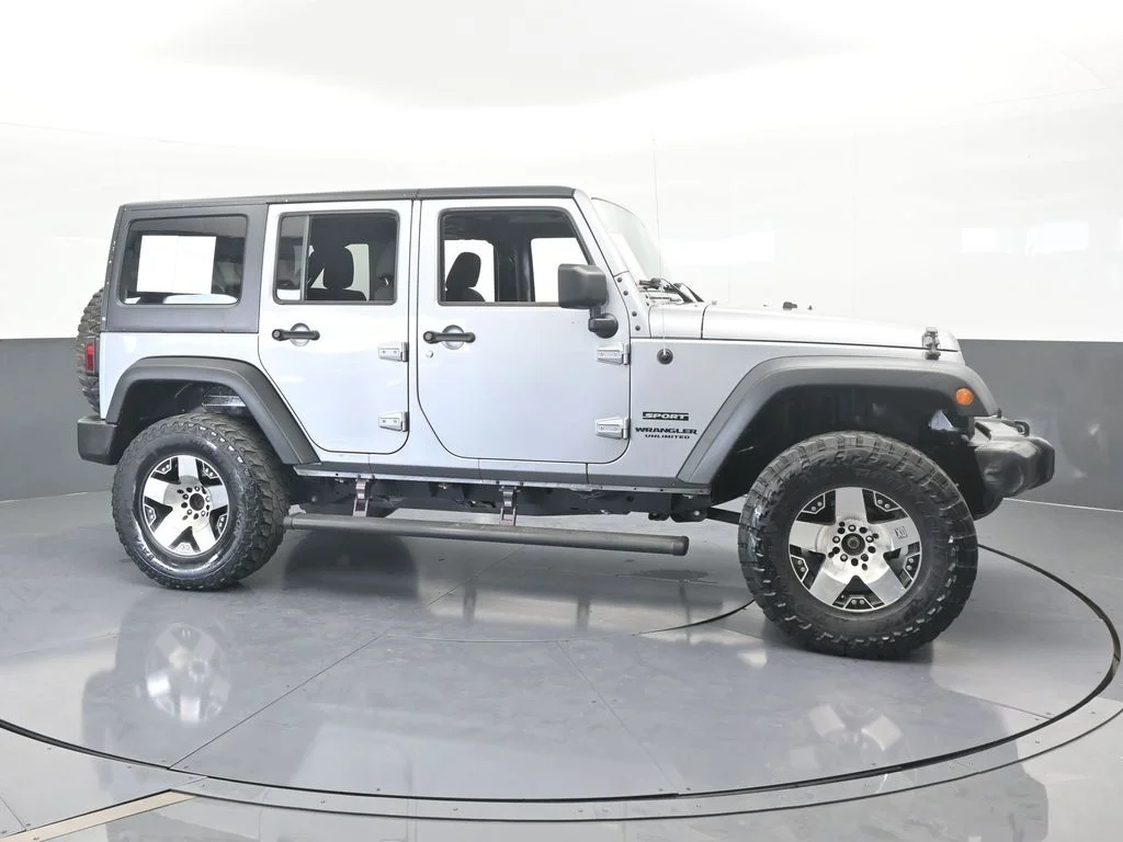 Used 2016 Billet Silver Metallic Clearcoat Jeep Unlimited Sport image 3
