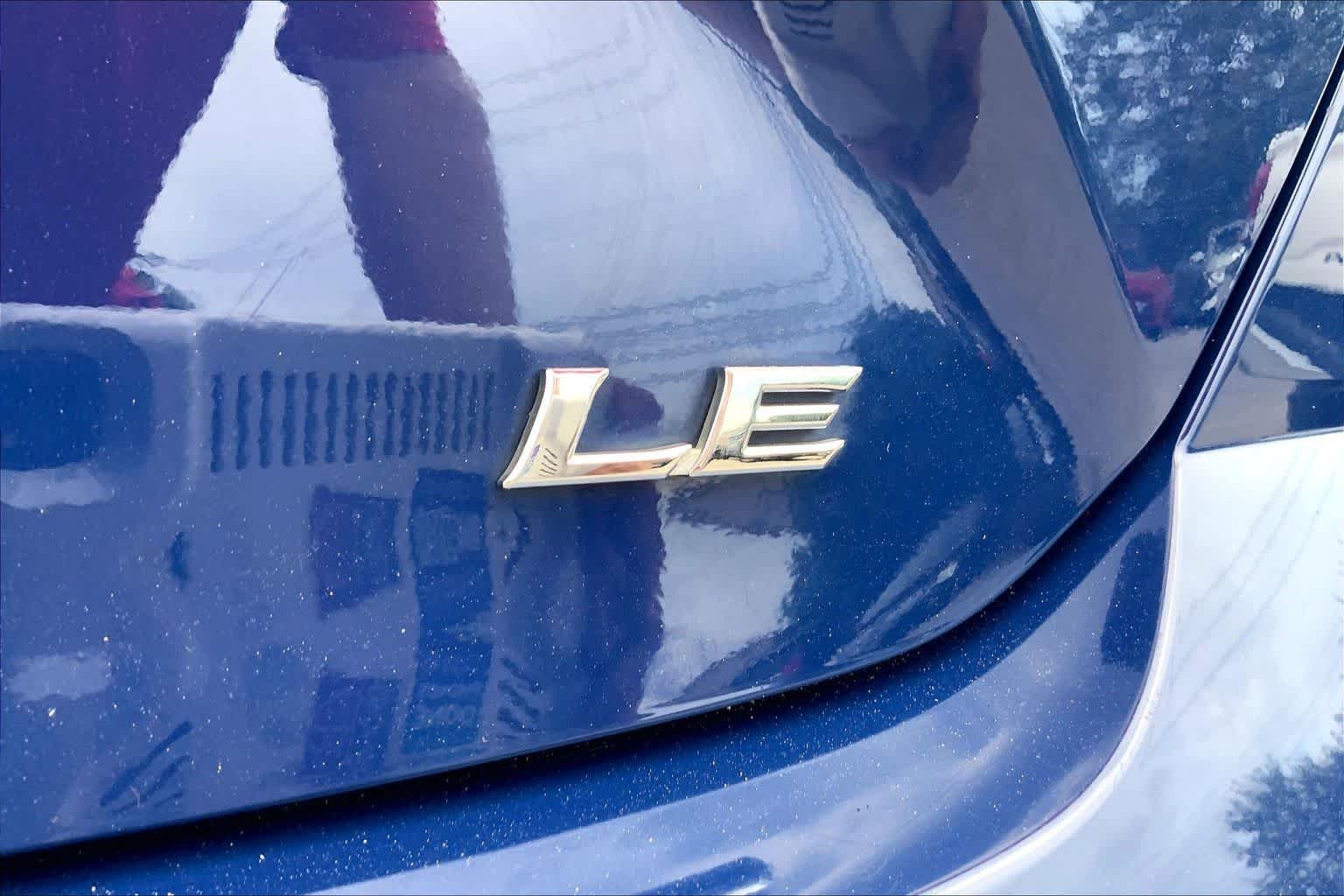 Used 2025 Reservoir Blue Toyota LE image 10