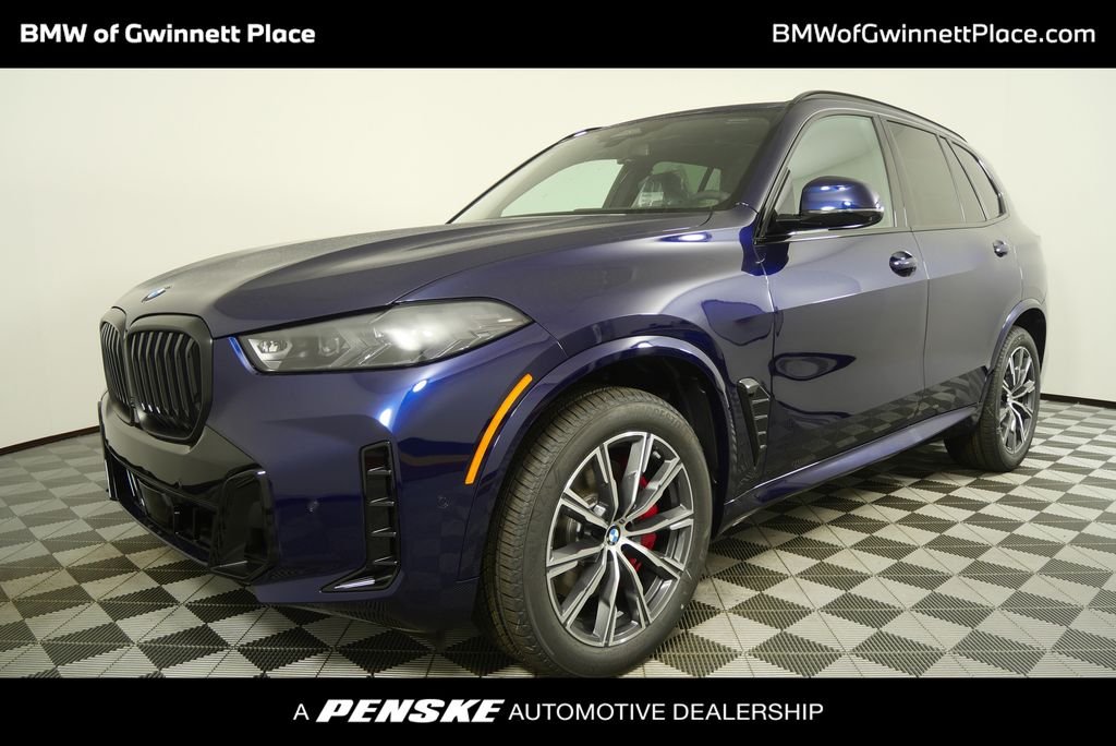 Used 2026 Tanzanite Blue II Metallic BMW xDrive40i image 1